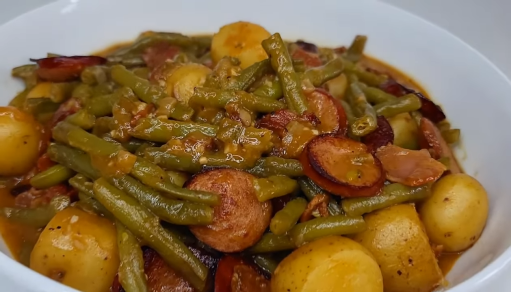 Smothered green beans with sausage & potatoes. Recipe quick and easy