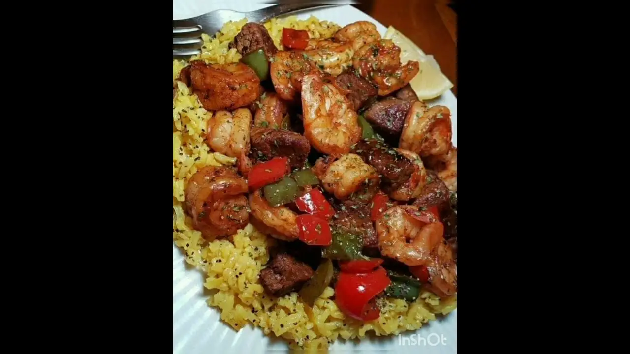 Jerk Steak and Shrimp over Yellow Rice