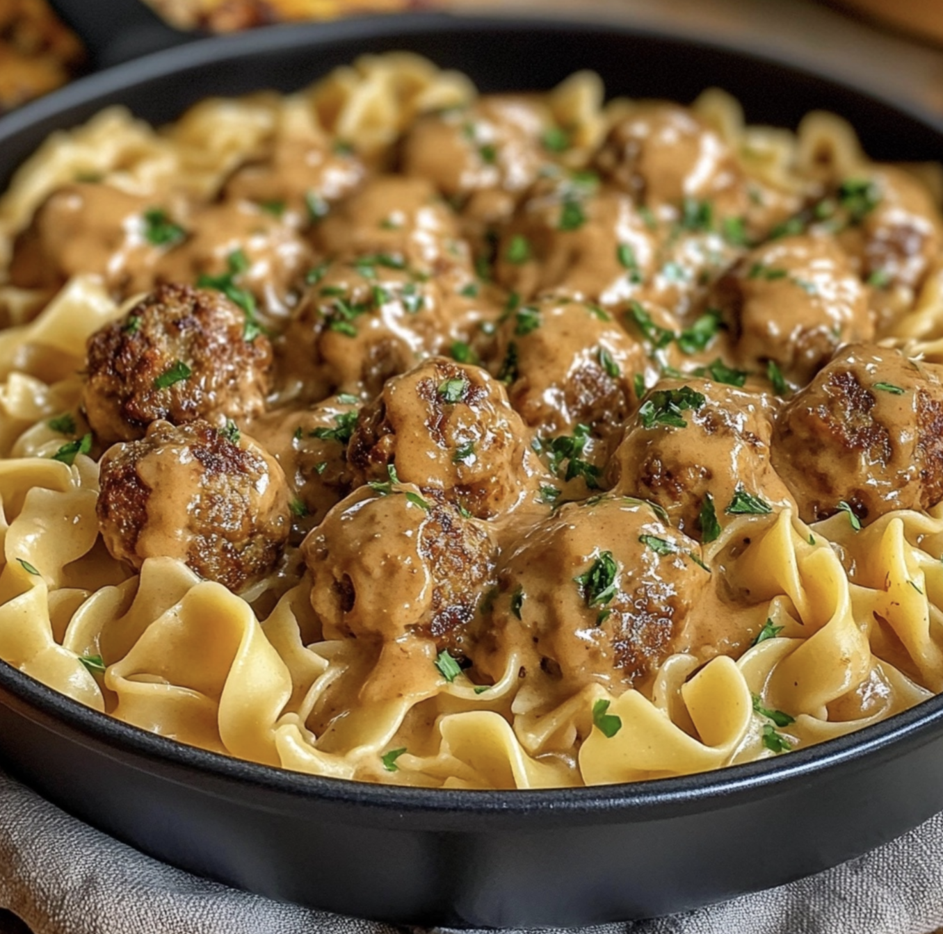 swedish meatballs served with egg noodles