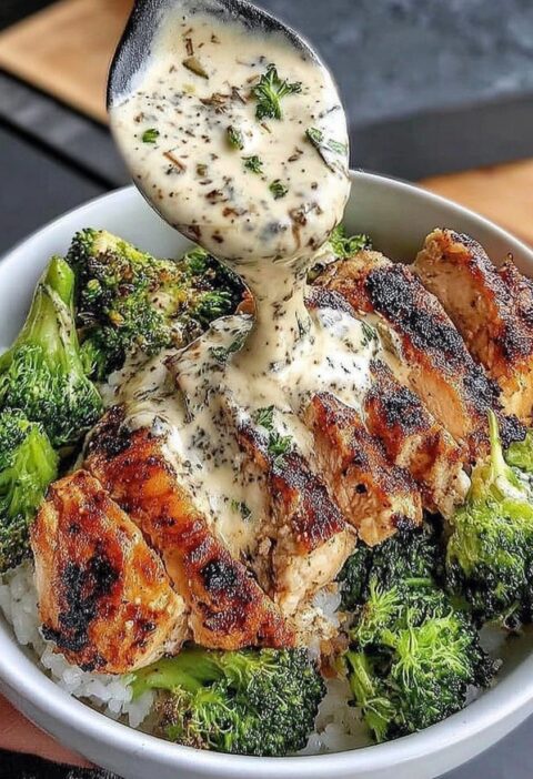 Grilled chicken and broccoli bowl with creamy garlic sauce