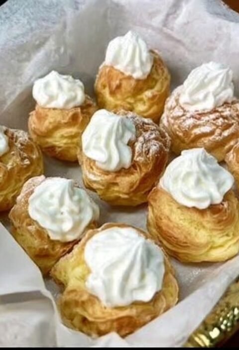 homemade cream puffs light airy and filled with sweet vanilla whipped cream
