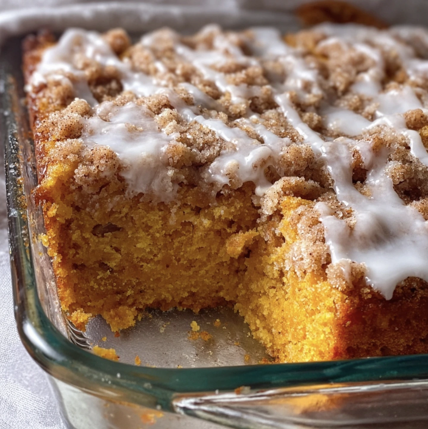 pumpkin cinnamon crumb cake with vanilla glaze