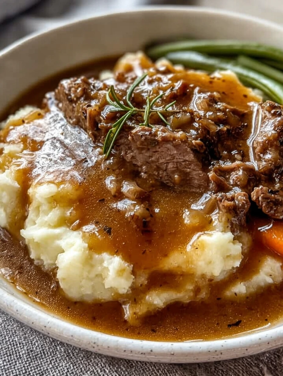 beef and gravy with mashed potatoes